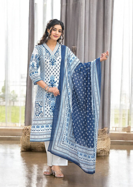 Woman wearing a blue and white printed cotton suit with a matching dupatta and straight pants
Smiling woman wearing a three-quarter sleeve blue and white floral printed cotton kurta with straight white pants and a matching printed dupatta