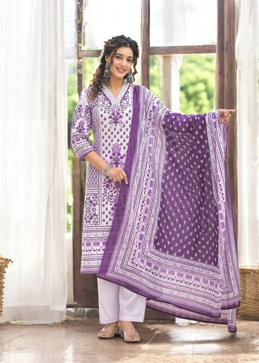 Woman wearing a purple and white printed cotton suit with a matching dupatta and straight pants
Smiling woman wearing a three-quarter sleeve purple and white floral printed cotton kurta with straight white pants and a matching printed dupatta